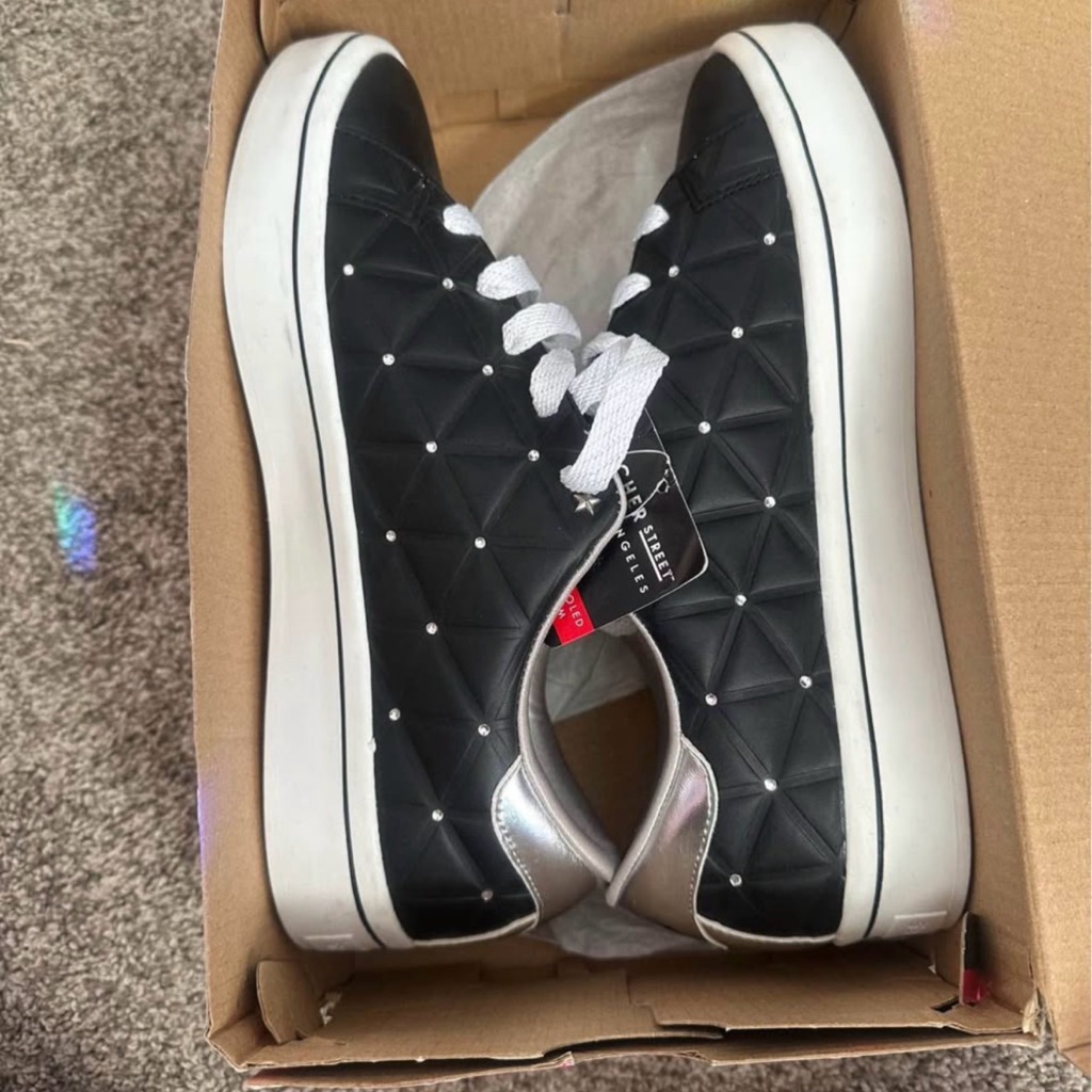 Skechers Black Quilted Sneakers With White And Silver Accents
